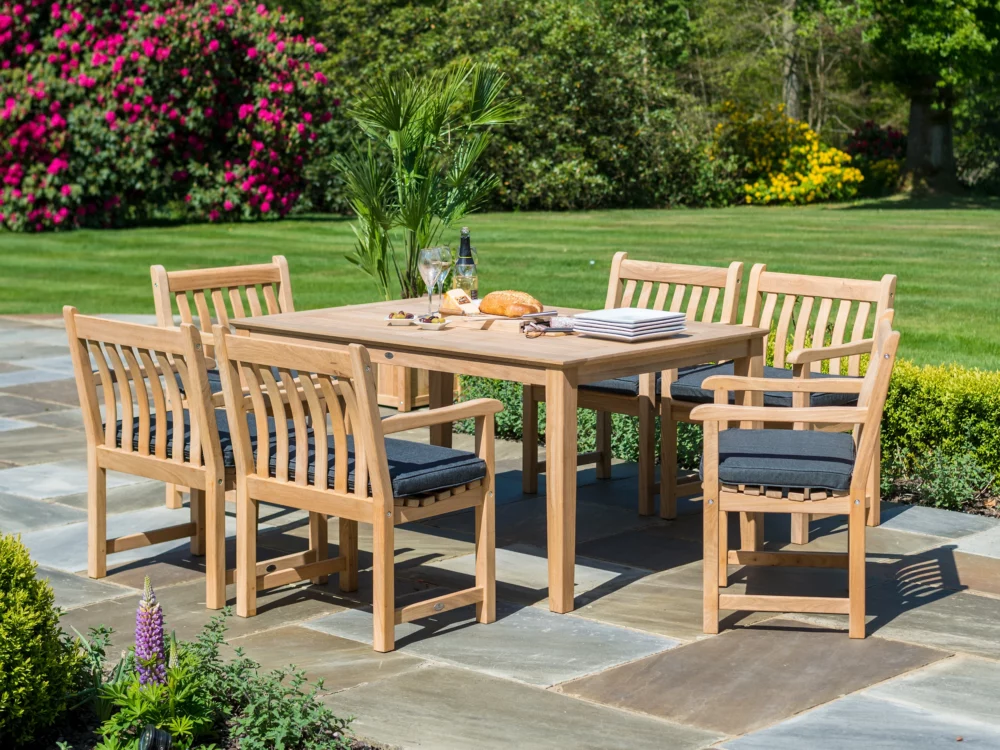 6 Alexander Rose Broadfield Armchairs around a Tivoli Rectangular Dining Table Olefin Charcoal Armchair Cushions High Quality Hardwood Garden Furniture