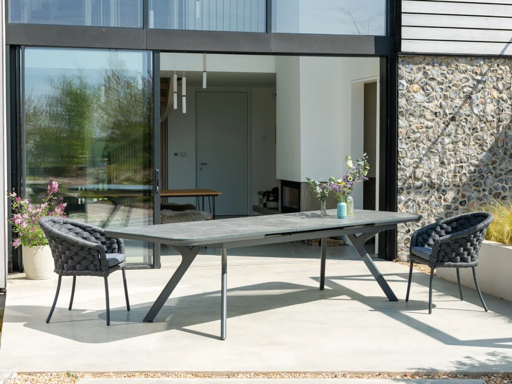 Alexander Rose Dark Grey Cordial Luke Dining Chairs and Extending Rimini Table Luxury Aluminium Garden Furniture