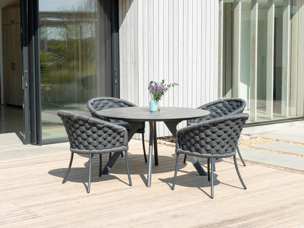Alexander Rose Dark Grey Cordial Luke Dining Chairs and Round Rimini Table Luxury Aluminium Garden Furniture