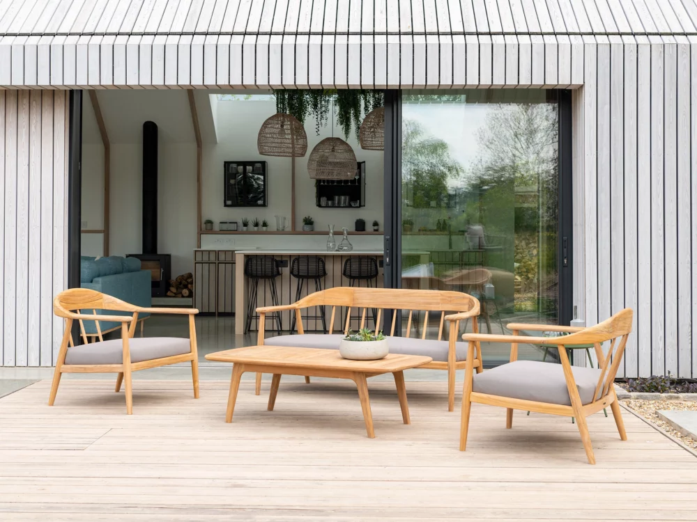 Award winning Alexander Rose Dana Lounge Set Teak Sofa, Two Teak Lounge Chairs and a Teak Coffee Table Mid Century Danish Inspired Outdoor Lounge Set