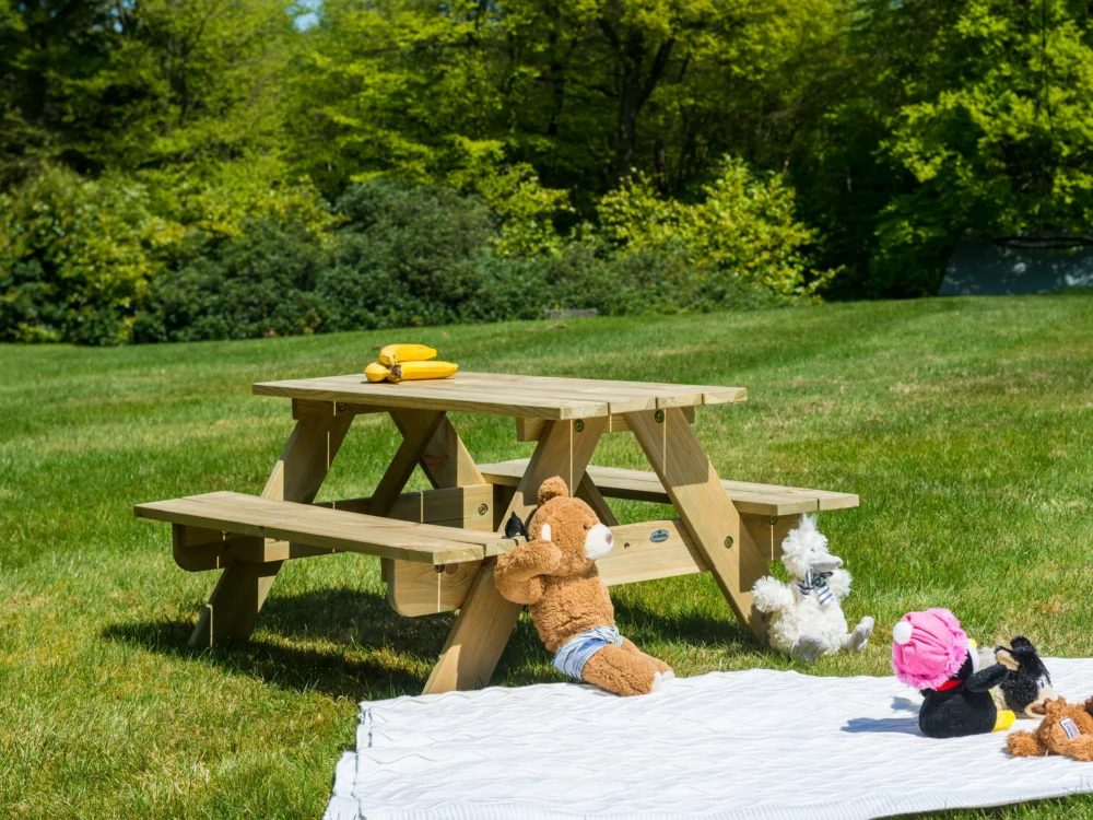 Alexander Rose Malu Pine Children's Picnic Table 2ft Childs toys resting on the bench High Quality Pine Garden Furniture
