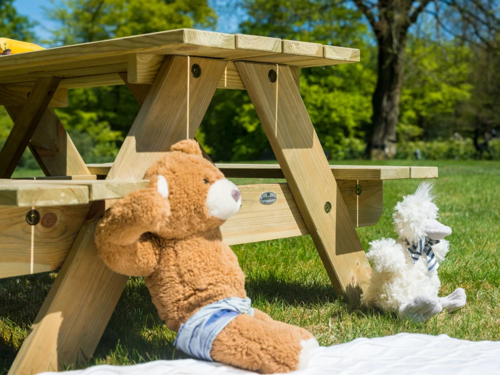 Alexander Rose Malu Pine Children's Picnic Table 2ft Childs toys resting on the bench High Quality Pine Garden Furniture